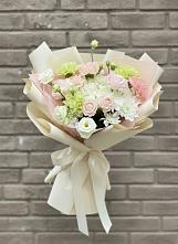 Букет цветов из:  Гвоздики, Розы, Лизиантусы и Хризантемы в Маджалисе